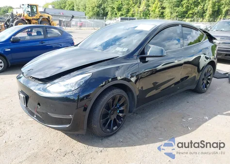 2023 Tesla Model Y Awd/Long Range Dual Motor All-Wheel Drive z USA, uszkodzony, nr VIN 7SAYGDEE6PF836419